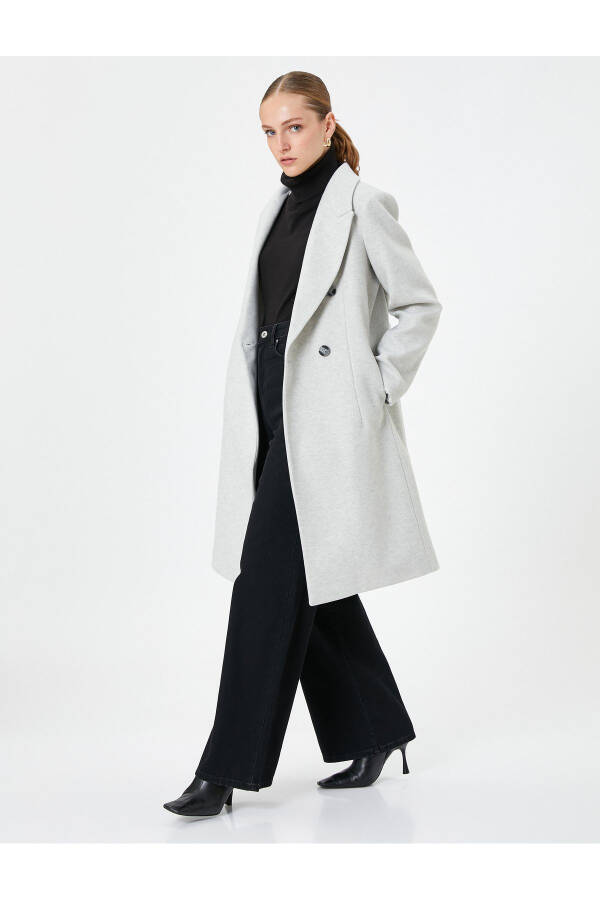 Long, double-breasted, buttoned pocket detail, belted wool coat. - 10