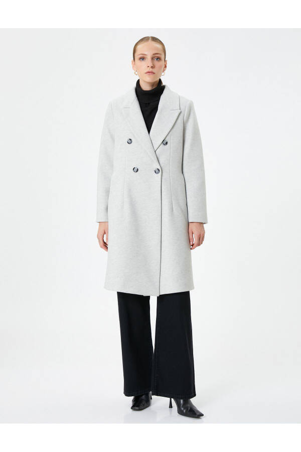 Long, double-breasted, buttoned pocket detail, belted wool coat. - 11