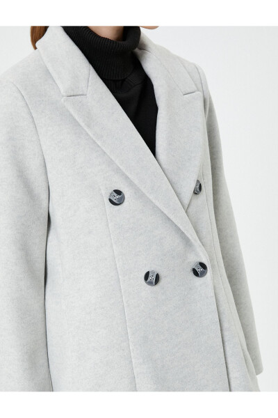 Long, double-breasted, buttoned pocket detail, belted wool coat. - 13