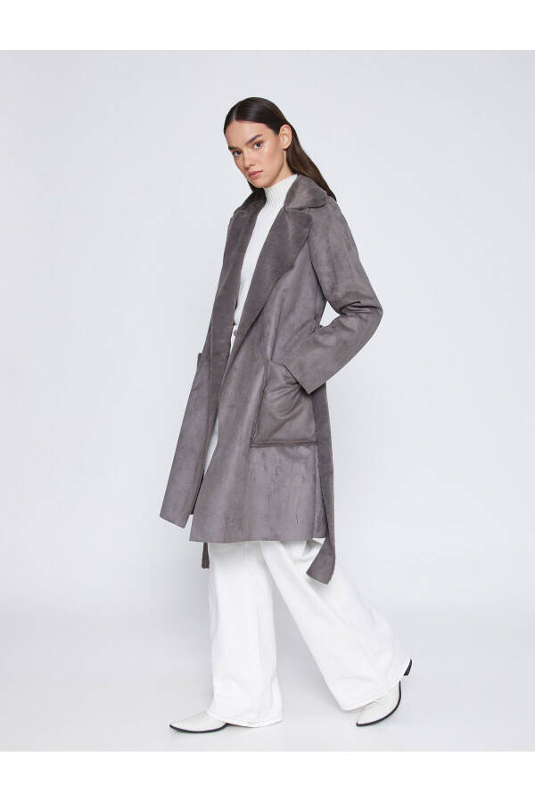 Long, suede-look coat with a belt and wide collar. - 1