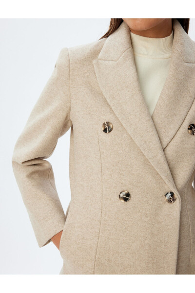 Long, wool coat. Featuring a crossover collar, hidden pockets and thick knit details. - 7