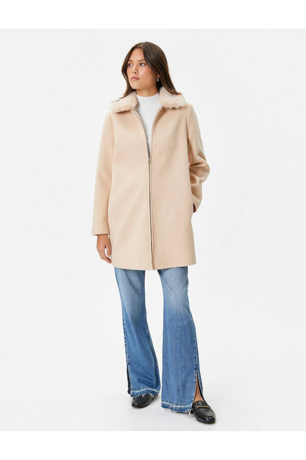 Long, wool coat with detachable faux fur collar, zipper closure. - 11