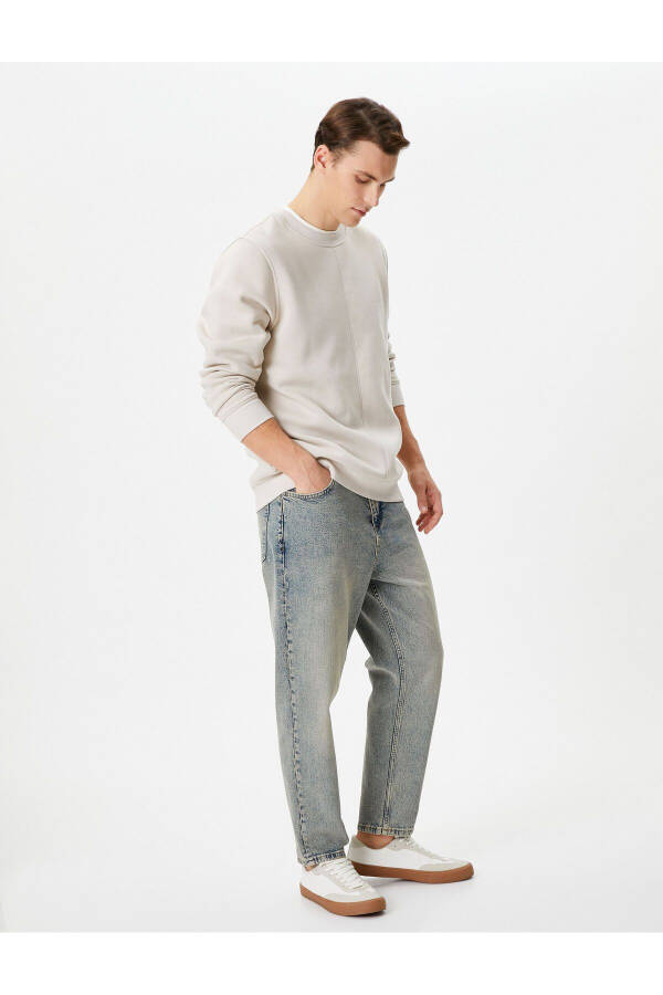 Loose fit washed denim jeans by Steve Jean. - 1