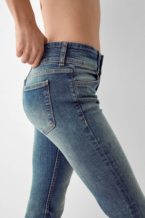 Low Waist Bootcut Jean - 6