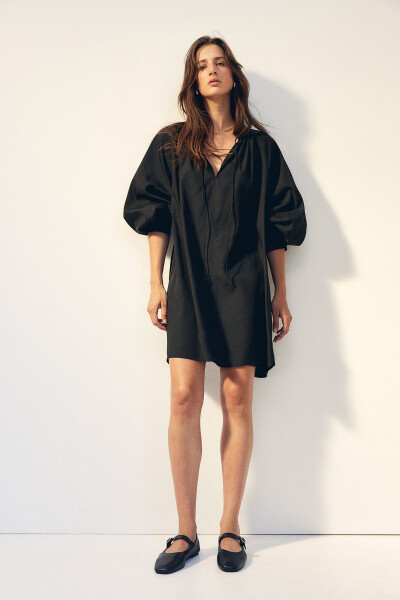 Oversized dress with lace details. - 2