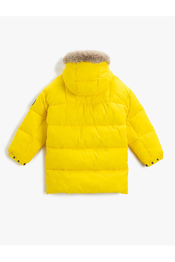 Padded hooded puffer jacket with faux fur detail pockets. - 11