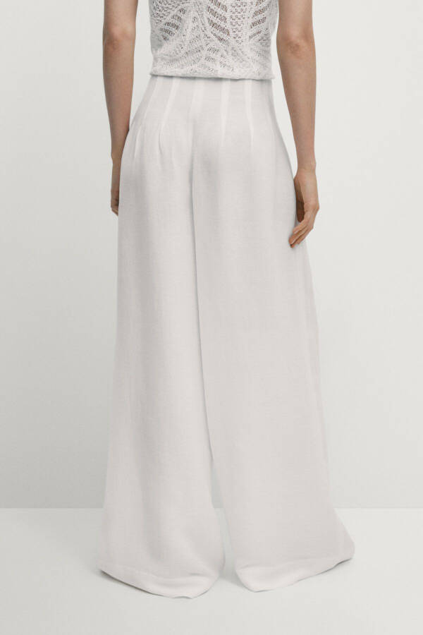 Pleated wide leg pants. - 4