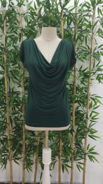 Sandy blouse with a decolletage neckline and short sleeves. - 6