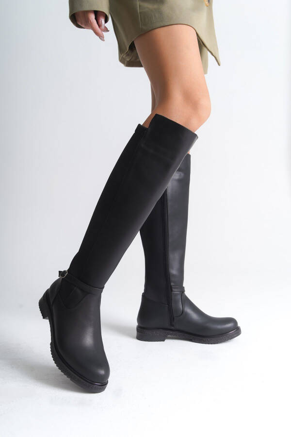 Side zipper, front band detail, boots. - 2