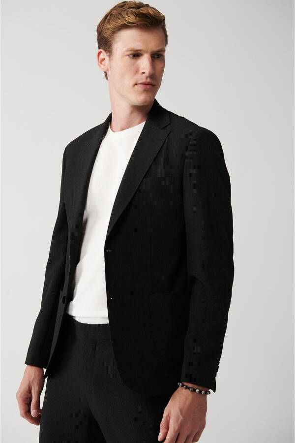 Slim fit, double breasted, black, textured, unlined men's jacket. - 6