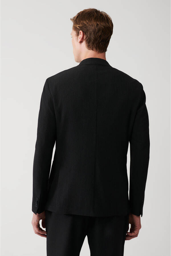 Slim fit, double breasted, black, textured, unlined men's jacket. - 9