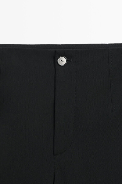 Slim fit, technical fabric trousers with a barrel leg. - 15