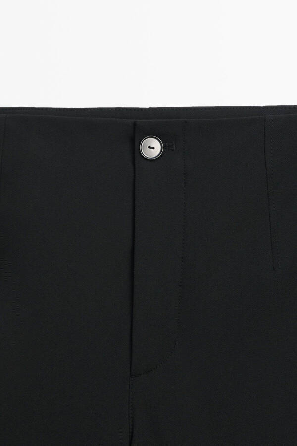 Slim fit, technical fabric trousers with a barrel leg. - 15