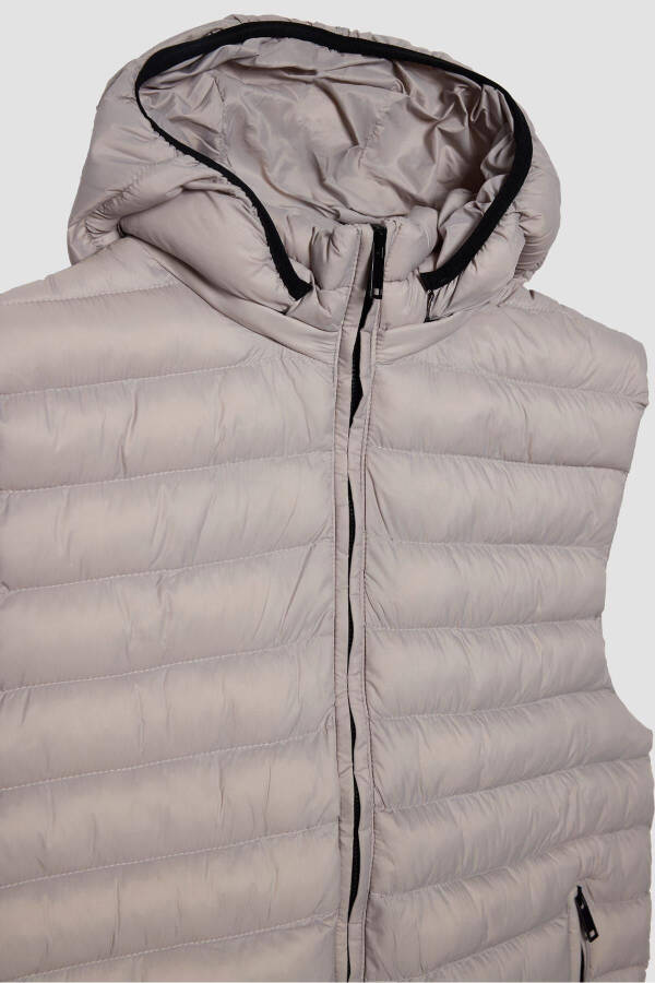 Stone-colored, detachable hooded, slim fit, lined, windproof, pocket puffer vest. - 1