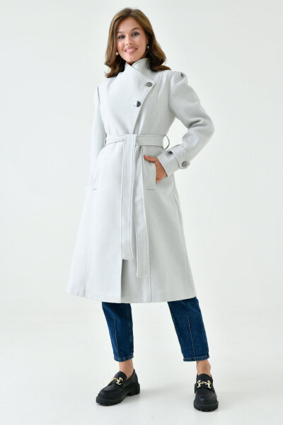 Stone-colored wool coat, buttoned, shawl collar, belted, lined, long sleeves. - 6