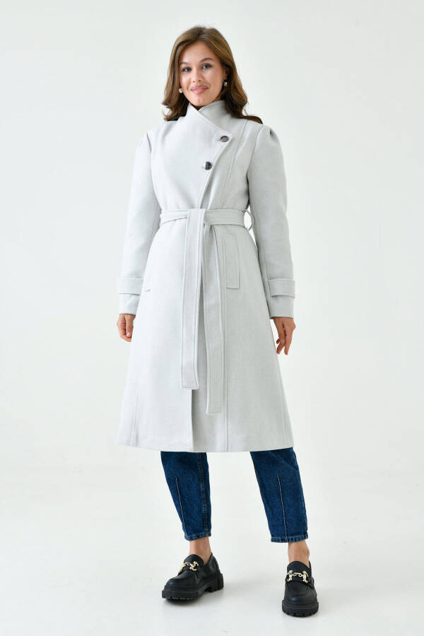 Stone-colored wool coat, buttoned, shawl collar, belted, lined, long sleeves. - 8