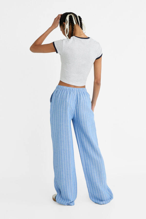 Striped relaxed fit linen blend trousers - 10