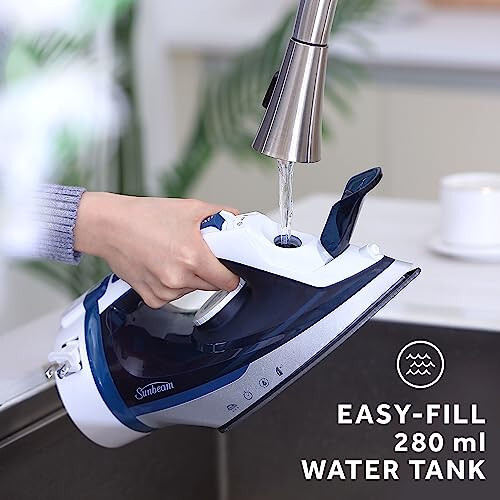 Sunbeam 1700W Steam Iron, 8' Ret retractable Cord, Variable Temperature Select, Non-Stick Soleplate, Dual Spray Mist, Horizontal or Vertical Shot of Steam Feature, 3-Way Auto-Off, Blue and White - 7