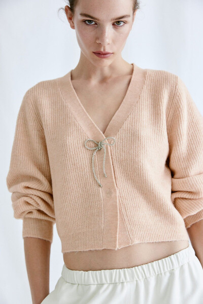 Sweater with faux diamond bow - 1