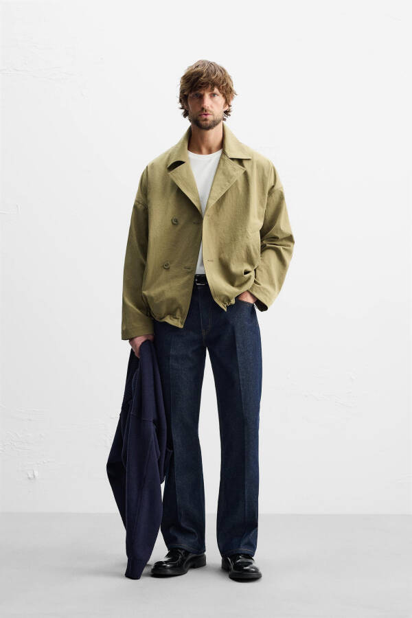 Technical short trench coat, perfect for rainy days. - 3