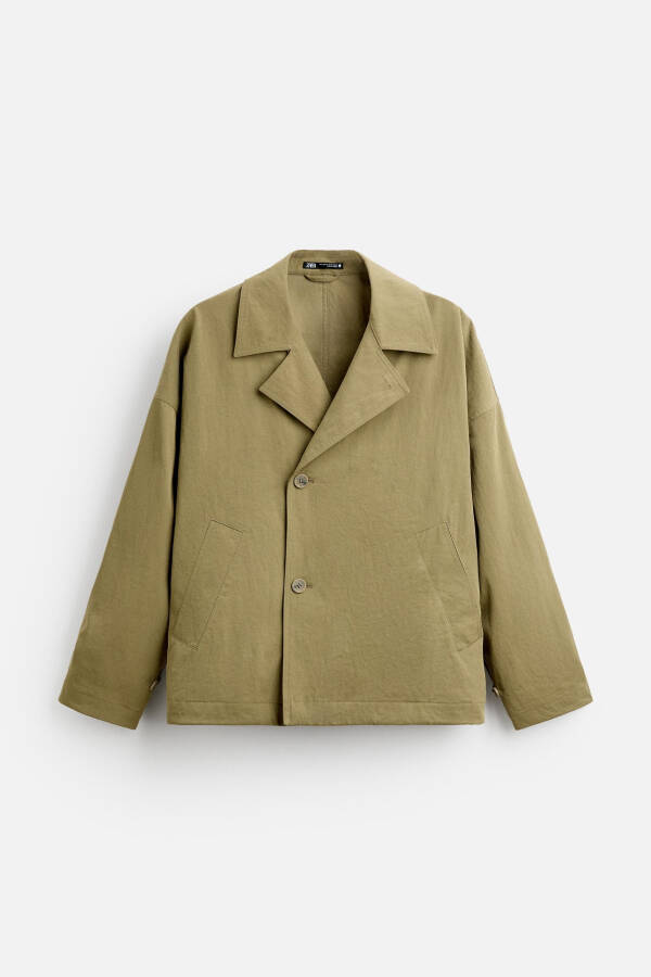 Technical short trench coat, perfect for rainy days. - 9