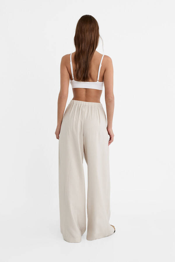 Textured Flowy Palazzo Pants - 3