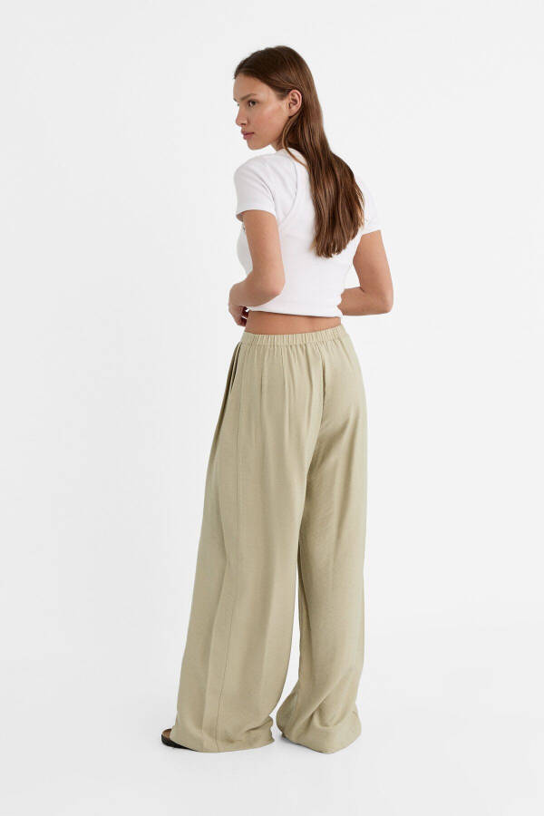 Textured Flowy Palazzo Pants - 10