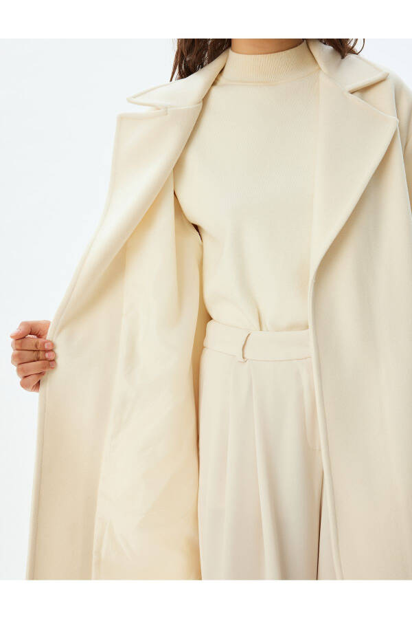 Thick knit, belted, pocket coat. - 7