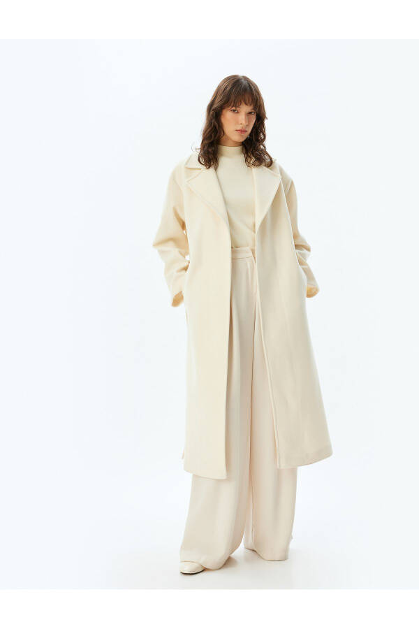 Thick knit, belted, pocket coat. - 2