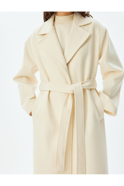 Thick knit, belted, pocket coat. - 6