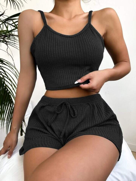 Two-piece set featuring a sleeveless, V-neck crop top and a thick ribbed corset. - 1