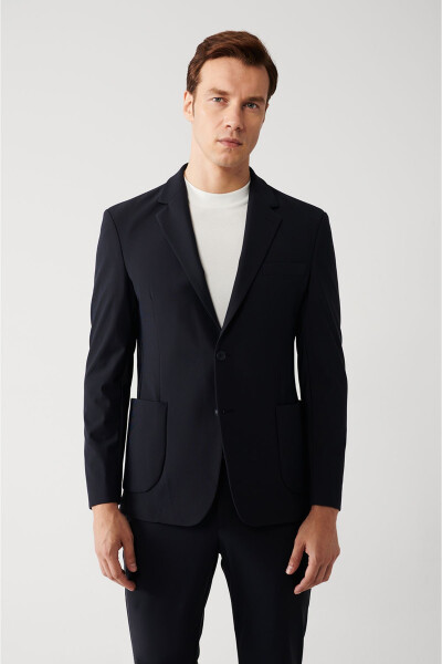 Water-resistant, 360 degree stretch, slim fit, single button, double vent, unlined navy blue men's jacket. - 6