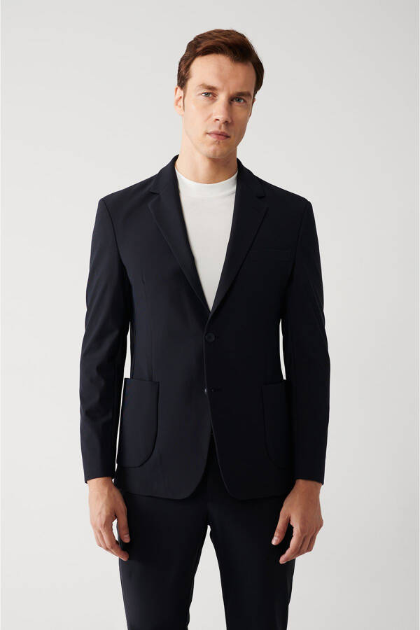 Water-resistant, 360 degree stretch, slim fit, single button, double vent, unlined navy blue men's jacket. - 6