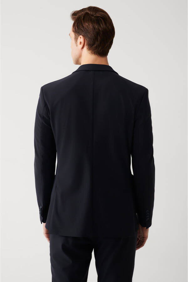 Water-resistant, 360 degree stretch, slim fit, single button, double vent, unlined navy blue men's jacket. - 9