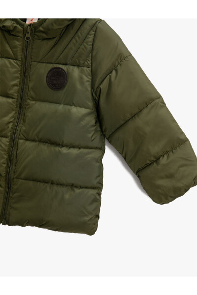 Waterproof puffer jacket with a hood. - 3