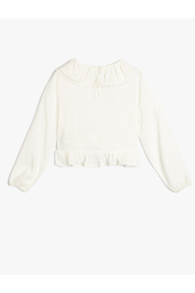 Wide blouse with a baby collar, long sleeves, frilled cuffs and elastic. - 2