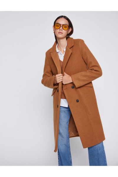 Wide collar coat with button details and pockets. - 7