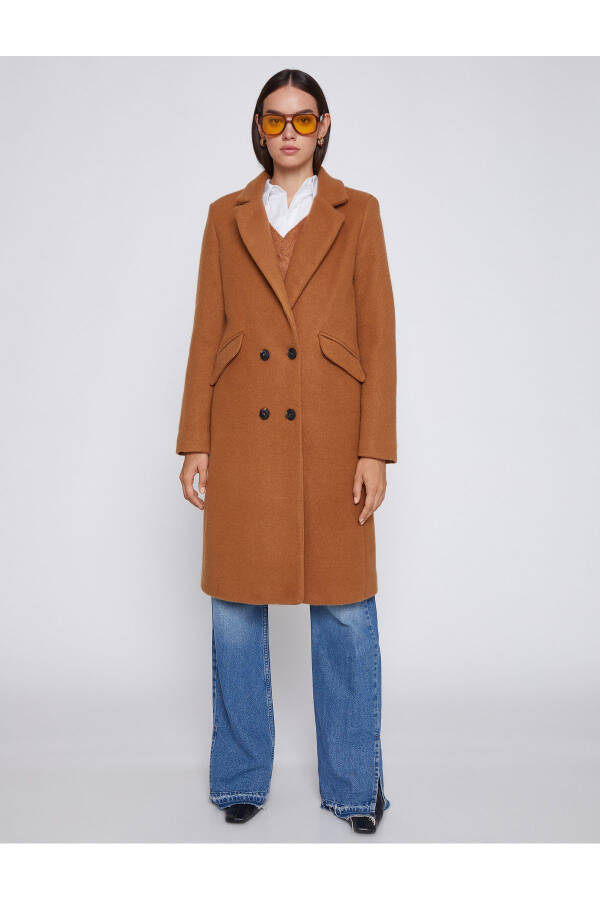 Wide collar coat with button details and pockets. - 8