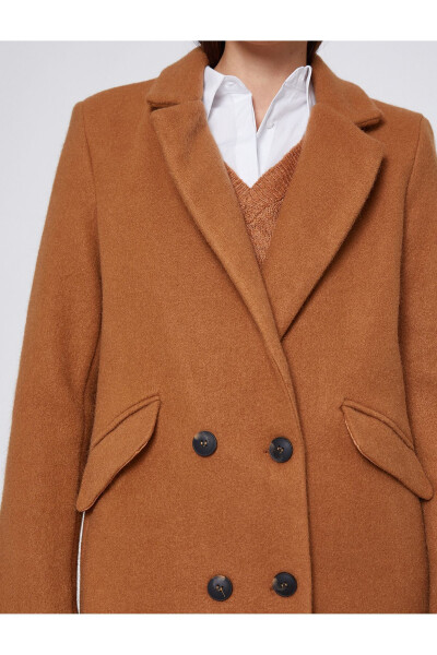 Wide collar coat with button details and pockets. - 10