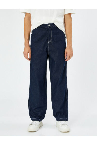 Wide leg cargo pants with button details. - 4