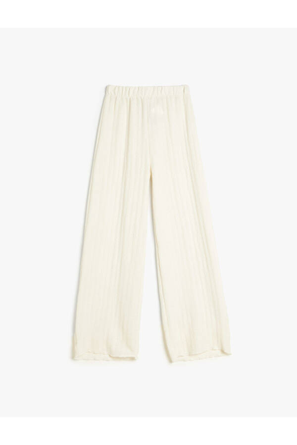 Wide leg, elastic waist, textured pants. - 4