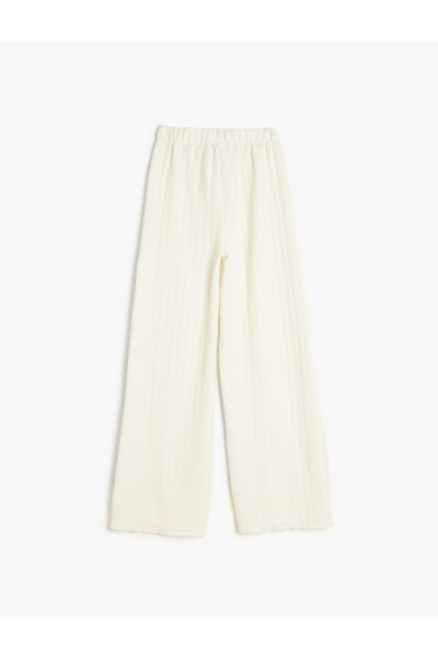 Wide leg, elastic waist, textured pants. - 5