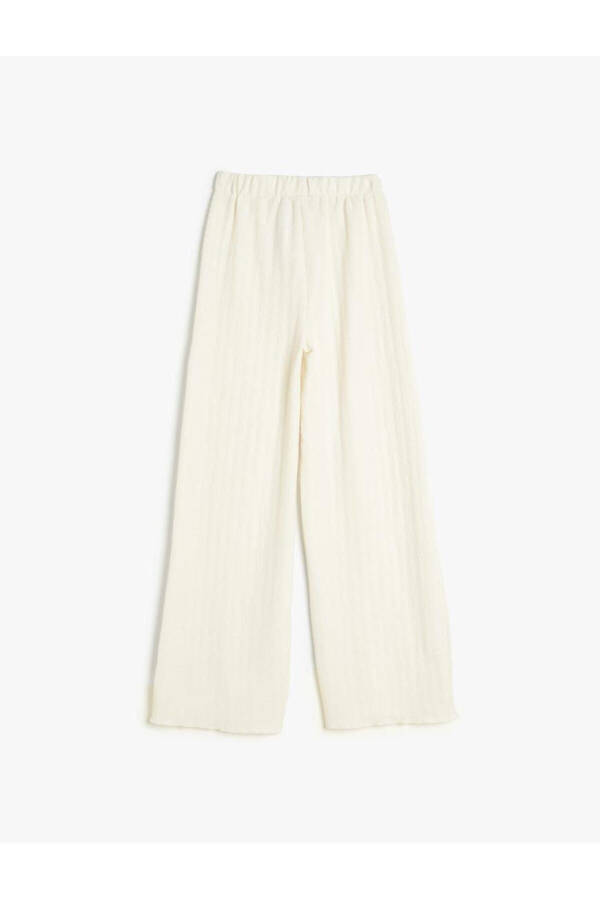 Wide leg, elastic waist, textured pants. - 2