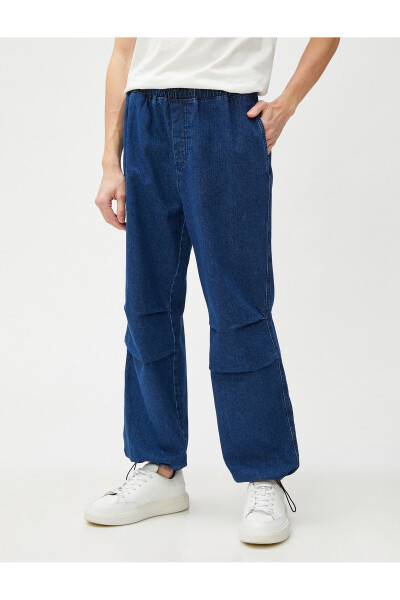 Wide leg, pocket detailed, cotton parachute pants with drawstring waist and hem. - 3