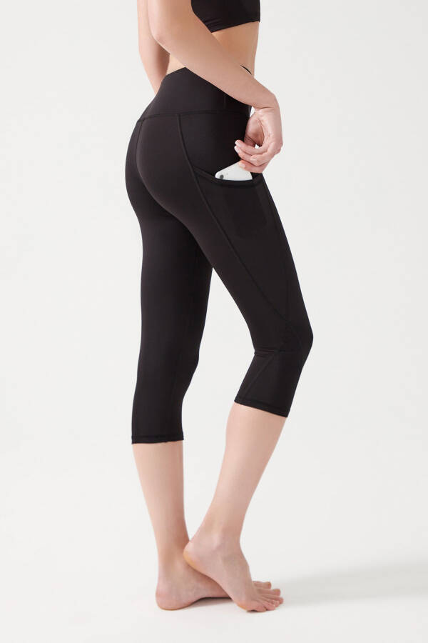 Women's Black High-Waist Shaping Double Pocket Below Knee Capri Leggings - 1