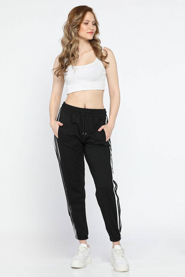 Women's Elastic Waist and Cuff Tracksuit Bottoms with Side Stripes - 1