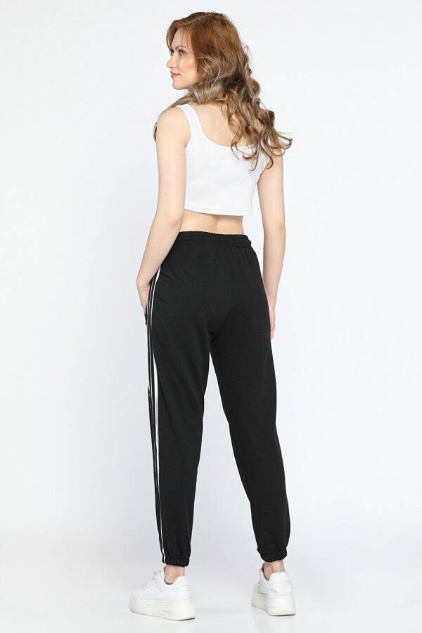 Women's Elastic Waist and Cuff Tracksuit Bottoms with Side Stripes - 3