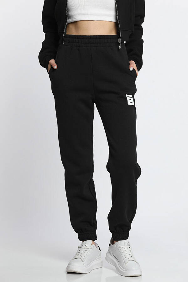 Women's Fleece 3-Thread Pocket With Arm Detail Elastic Leg Jogger Sweatpants - 1