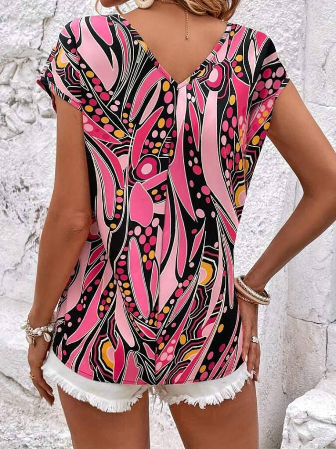 Women's short-sleeved blouse with pink pattern, V-neck, batwing sleeves, short front and long back. - 3