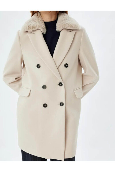 Wool coat with detachable faux fur collar, pockets and buttons. - 29